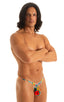 most popular mens sexy micro string bikini swimsuit by skinz swimwear in Semi Sheer Hibiscus Printed Mesh; Sunseeker Micro Pouch Half Back Bikini in Semi Sheer