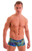 mens swimwear square cut boxer style swimsuit in Tan Through Tahitian; Extreme Low Square Cut Swim Trunks in Tan Through Tahitian, Rear View; Extreme Low Square