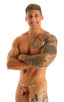 mens micro g string sexy swimsuit bikini in best seller skinz swimwear in Semi Sheer Hibiscus Print on Mesh; Stuffit Pouch G String Swimsuit in Semi Sheer Hibis