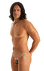 mens extreme micro string bikini tiny swimsuit by skinz swimwear in Semi Sheer Hibiscus Print on Mesh; Stuffit Pouch Half Back Swimsuit in Semi Sheer Hibiscus P