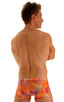 mens swimwear square cut boxer style swimsuit in Tan Through Orange Jungle; Extreme Low Square Cut Swim Trunks in Tan Through Orange Jungle, Rear View; Extreme