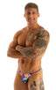 mens tiny string bikini swimsuit by skinz swimwear in white hiniscus floral; Sunseeker2 Tanning Swimsuit in Super ThinSKINZ Night Sky 2; Sunseeker2 Tanning Swim