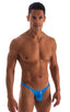 mens micro pouch bikini swimsuit brief in electric blue; Stuffit Pouch Bikini Swimsuit in Ice Karma Electric Blue, Rear View; Stuffit Pouch Bikini Swimsuit in I