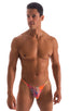 mens tan through swimsuit bikini brief in orange jungle man micro swimwear; Sunseeker2 Tanning Swimsuit in Tan Through Orange Jungle, Rear View; Sunseeker2 Tann