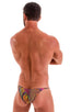 mens see through dali mesh micro pouch swimsuit half back bikini skinz swimwear; Stuffit Pouch Half Back Tanning Swimsuit in Semi Sheer Neon Dali Mesh, Rear Vie