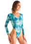 Womens rash guard one piece suit with long sleeves and  high leg cut, thong back, sexy womens rash guard for surfing and fishing, Woman wearing a blue and green patterned swimsuit on a white background