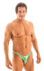 Fitted Bikini Bathing Suit in Ice Karma Emerald Green, Front View; Fitted Bikini Bathing Suit, Front View; Fitted Bikini Bathing Suit A man wearing a metallic green Brazilian-style bikini posing for the camera.