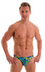 mens bikini swimsuit brief international male swimwear speedo by skinz swimwear in Tan Through Tahitian; Bikini Brief Swimsuit in Tahitian Rainforest Tan Throug