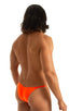 mens extreme micro string bikini tiny swimsuit by skinz swimwear in Blazing Orange; Stuffit Pouch Half Back Swimsuit in Blazing Orange 2; Stuffit Pouch Half Bac