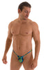 Roman G String Swim Thong in Tan Through Rainforest, Front View; Roman G String Swim Thong in Tan Through Rainforest, Rear View; Roman G String Swim Thong in Ta