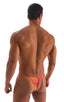 mens tan through swimsuit bikini brief in orange jungle man micro swimwear; Sunseeker2 Tanning Swimsuit in Tan Through Orange Jungle, Rear View; Sunseeker2 Tann