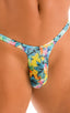 most popular mens swimwear classic t back thong swimsuit in lilly lagoon tan-through printed fabric; ; T Back Thong Swimsuit This image features a male model sporting the Mens Bravura Pouch Thong from the Prints collection. The swimwear thong is designed with a full frontal seam for a contoured fit, emphasizing a snug and flattering silhouette.