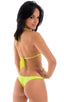 Womens Quick Release Low Rise Thong Swimsuit Bottom in Semi Sheer ThinSkinz Neon Chartreuse, Front View; Womens Quick Release Low Rise Thong Swimsuit Bottom in 